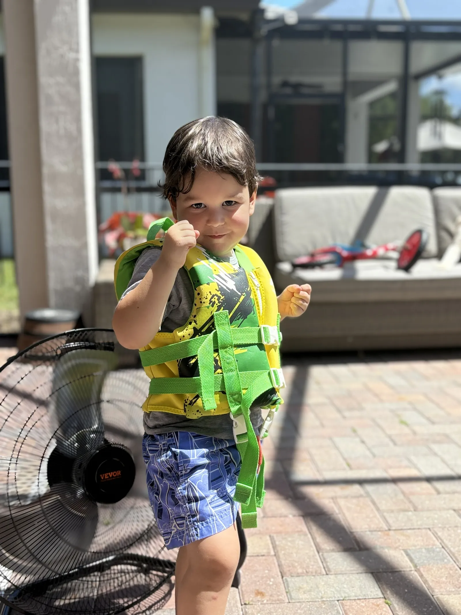 Nikko Dobbins wearing a life vest